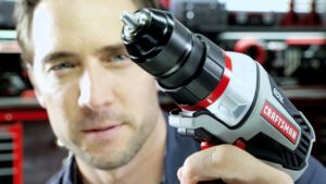 man holding drill
