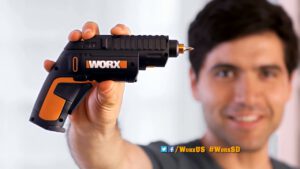 man holding drill