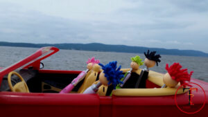mop tops driving in a convertible