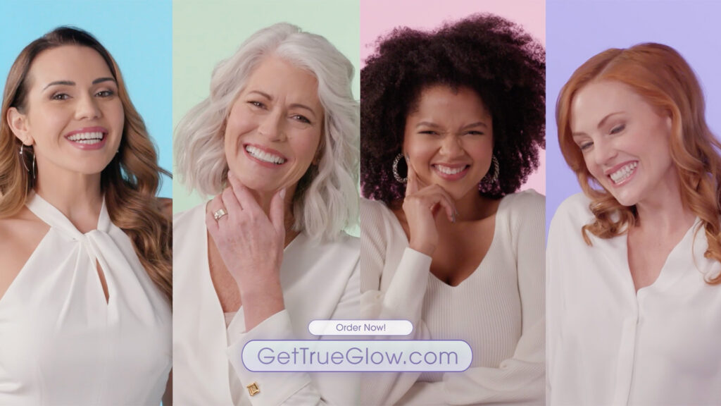 four women smiling